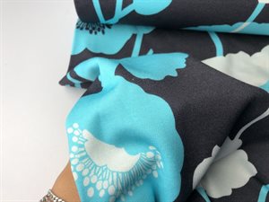 Let vinterjersey - store turkis og hvide blomster